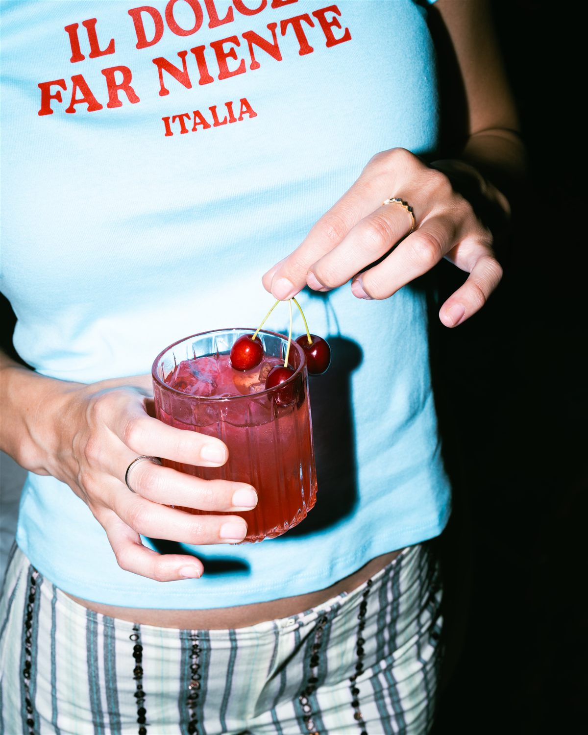 Holding a Materra cocktail